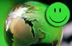 Green happy face on green earth 